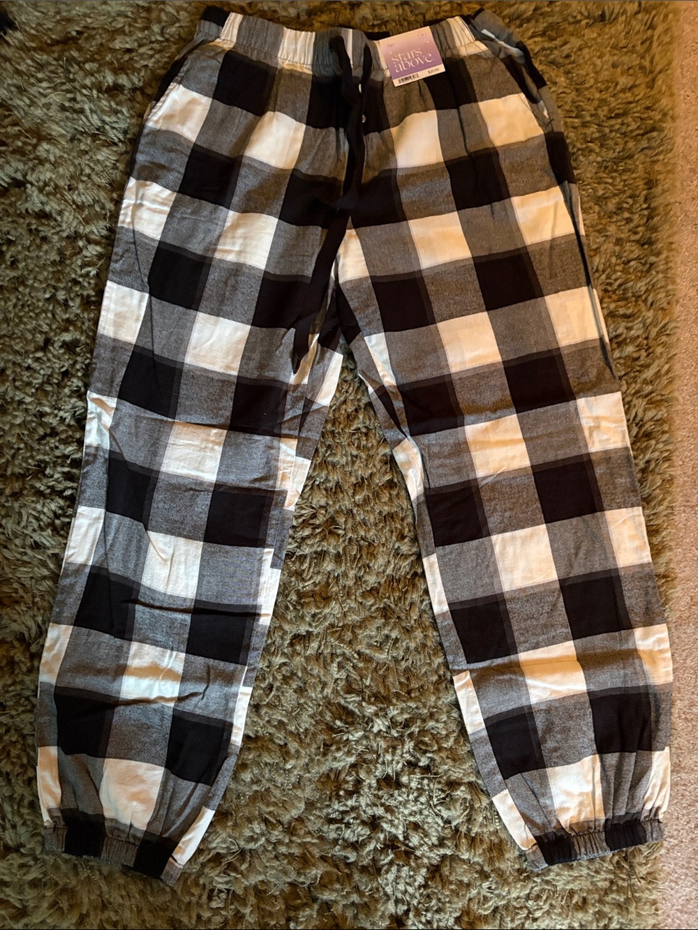 stars above Black and White Plaid Pajama Pants